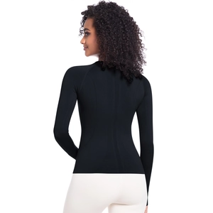 Close-up of the breathable seamless knit texture on the back of this black athletic shirt