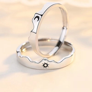 Adjustable sun and moon couple rings with silver mountain range textured edges