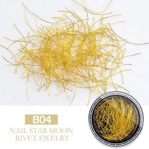 Macro shot of B04 gold nail art wire silk stored in a round container and loose on white background