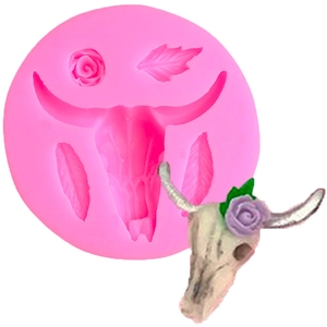 Detailed pink silicone mold for DIY crafts featuring bull skull and rose flower designs