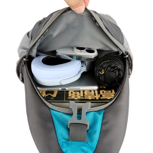 Waterproof sports crossbody bag in dark gray with blue accents showing large capacity