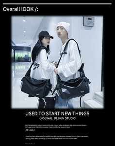 Street style duo showcasing black matte messenger bags in a modern interior setting