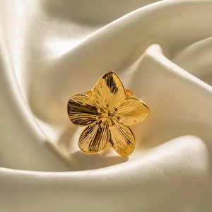 French vintage matte gold stainless steel flower open ring on white silk background