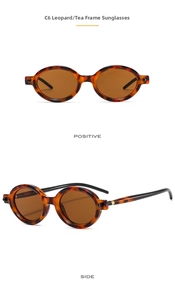 Detail of vintage oval leopard print sunglasses with tea lenses and retro PC frames