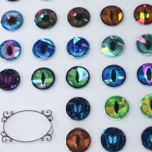 Macro detail of 3D dragon eye nail stickers with holographic butterfly designs TH-1285