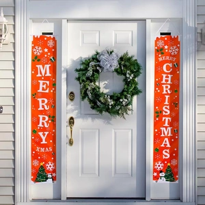 Vibrant orange Merry Christmas porch banners with snowflakes and snowmen on a white door
