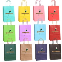 Detailed grid showing twelve assorted colors of bear-themed gift bags with twisted handles