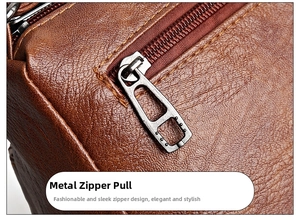 Close-up of durable silver metal zipper on a brown pebbled leather shoulder bag for women