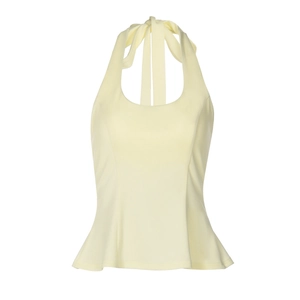 Detailed view of the yellow halter top featuring a slim fit and ruffled hemline