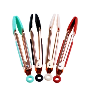 Set of four gold stainless steel food tongs with colorful silicone tips and ring pulls