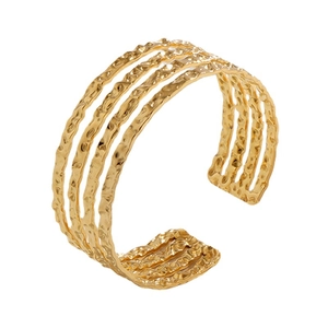 Minimalist gold stainless steel open cuff bracelet featuring irregular wavy textures