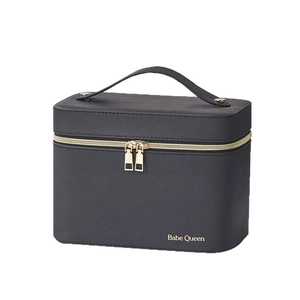 Black cross-grain leather makeup case with gold zipper and mirror shown from 45-degree angle