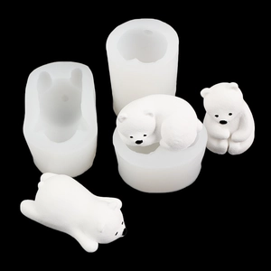 Polar bear silicone molds with finished 3D cake toppers for candle and mousse making