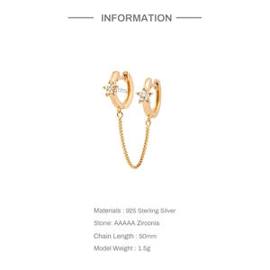 Detail of gold star chain earrings showing 925 silver specs and 50mm drop length