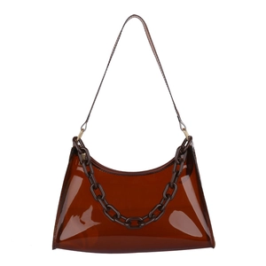 Brown transparent PVC shoulder bag with decorative chain on white background