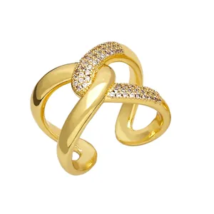 Elegant gold-plated criss-cross open ring with sparkling white zircon stones