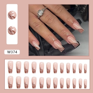 Long ballerina press-on nails with brown marble patterns and nude base set details