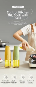 Detail view of the automatic opening glass oil bottle with a leak-proof silicone nozzle
