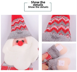 Detail of Christmas Santa plush buckle with knitted hat and Velcro hand closure