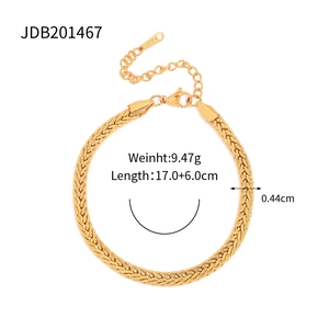 Close-up of golden braided chain bracelet with measurements and lobster clasp detail