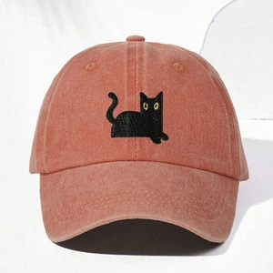 Washed cotton baseball cap in brick orange with embroidered black cat for kids and adults