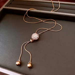 Vintage gold plated sliding tassel necklace with zircon sphere pendant and snake chain