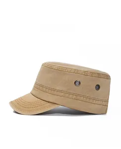 Side view of washed khaki cotton flat top cadet cap with metal eyelets and stitched brim