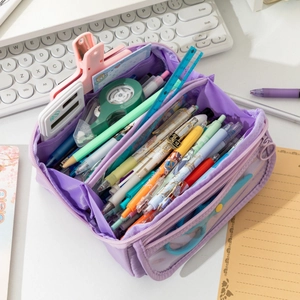 Detail of purple high-capacity pencil case with multiple layers and clear front pocket