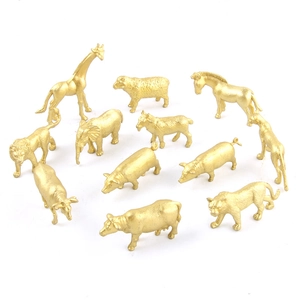 Set of 12 miniature golden forest animal figurines including lion, giraffe, and elephant