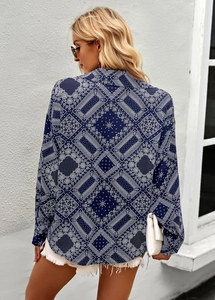 Detail of navy blue linen blend long sleeve shirt with white cashew floral print pattern