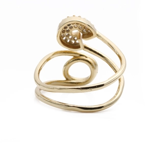 Detailed view of adjustable gold-plated spiral ring with shimmering pavé zircon accents