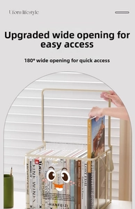 Detail of transparent book storage box with beige metal frame and books inside