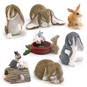 Ensemble de figurines de lapins miniatures avec lapins béliers et bol de nourriture