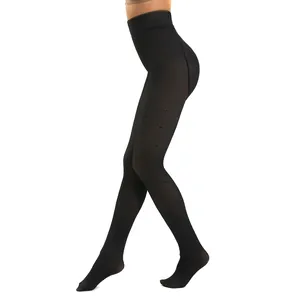 Detail of high waist black sheer leggings featuring a subtle woven star pattern texture