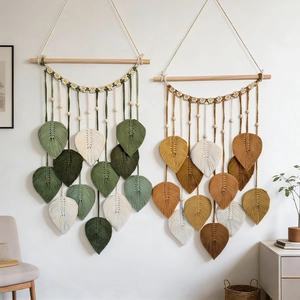 Handmade boho macrame leaf wall hanging with natural cotton rope and wooden beads decor