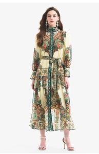 Full view of long-sleeve paisley print dress with lantern sleeves and matching waist belt