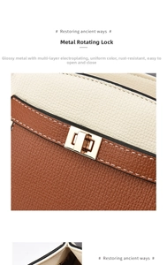 Detail of premium golden rotary lock and textured patchwork leather on the shoulder bag