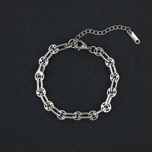 Detail of silver stainless steel bracelet featuring oval links and lobster clasp closure