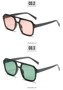 Detail view of retro square sunglasses with double bridge and colorful ocean lenses