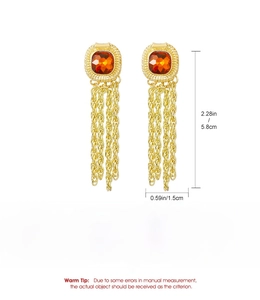 Detail view of gold vintage fringe earrings with dimensions and copper material specs