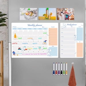 Magnetic weekly and monthly planner set with 6 markers on a stainless steel fridge