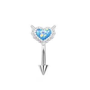 Macro shot of silver winged heart eyebrow ring with blue opal stone and conical tip