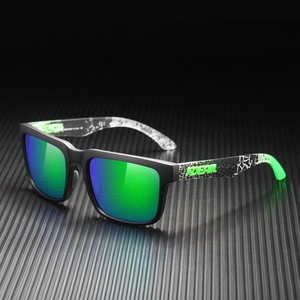 Macro detail of square polarized sunglasses with blue-green lenses and black-white textured temples