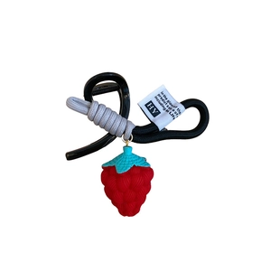 Cute red berry pendant with two-tone braided cord and minimalist woven label