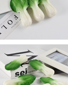 Detailed view of realistic PVC green vegetable leaf keychain with lifelike vein textures