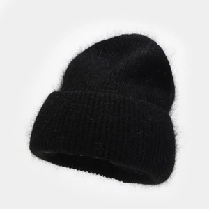 Close-up of black angora rabbit fur knit hat showing detailed ribbed texture and soft fluff
