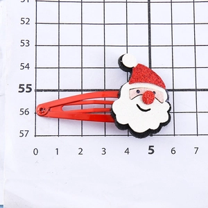 Simpatica molletta per capelli Babbo Natale con cappello glitter rosso e barba bianca