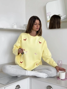 Light yellow long sleeve knit sweater with dachshund embroidery and relaxed fit for women