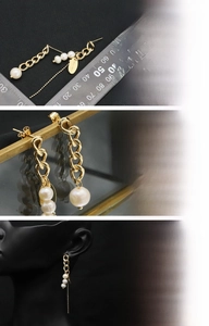 Detailed macro view of 18K gold plated chain earrings with natural freshwater pearls