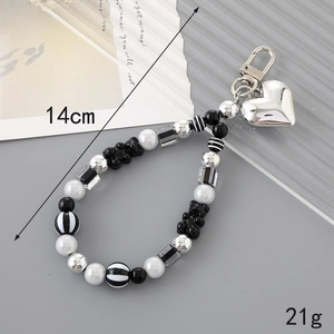 Beaded keychain with black bear charms and large silver heart pendant, 14cm length